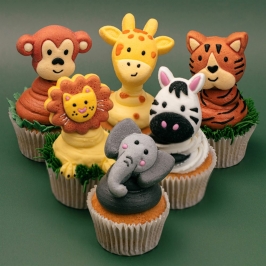 Cupcakes decorados con nubes de azúcar de animales de la selva