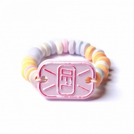 Reloj de caramelo comprimido con pica pica sabor fresa y colores variados