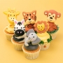 Cupcakes decorados con nubes de azúcar de animales de la selva