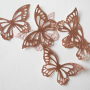 Mariposas Metalizadas de Oblea Oro Rosado 22 ud - Crystal Candy