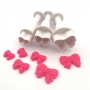 Set de 3 cortadores con expulsor con forma de lazo para decorar tus dulces Set de 3 cortadores con expulsor con forma de lazo para decorar tus dulces